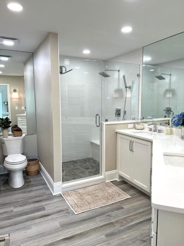 Master-Bathroom-Mirror-Magic. Sheet mirrors from backsplash to ceiling