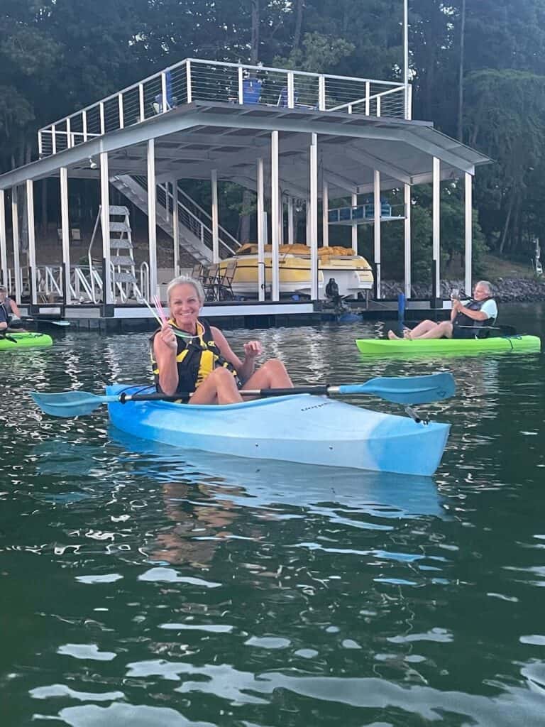 kyaking with the dock in the background