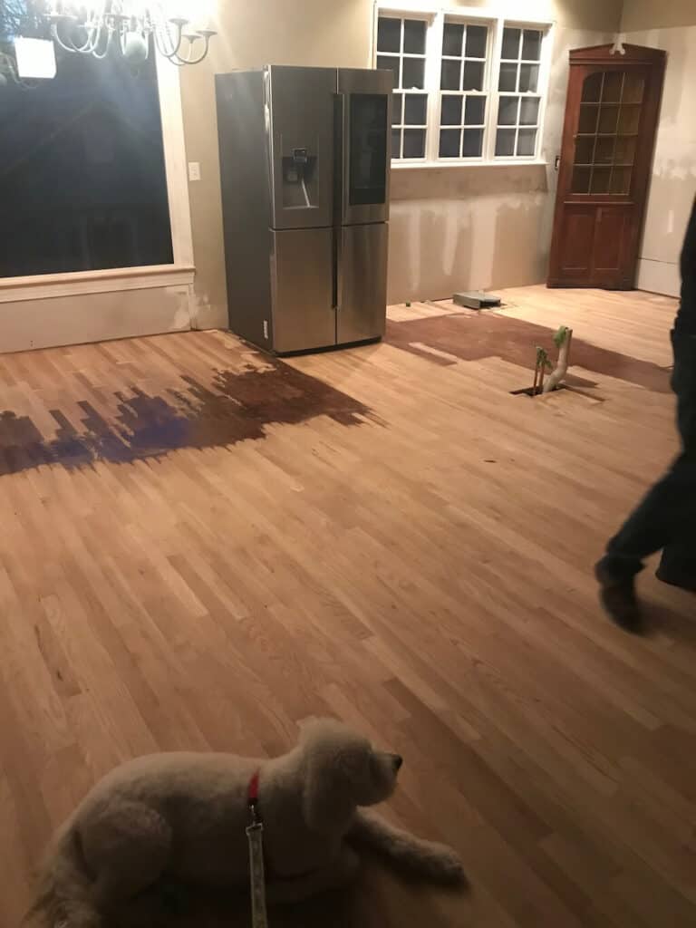 The process of sanding and refinishing hardwood floors