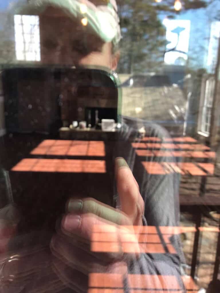 Newly stained hardwood floors as seen from the outside