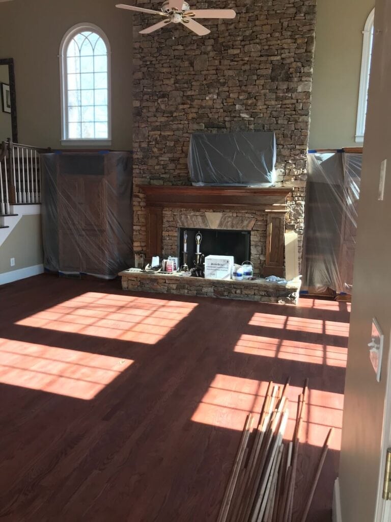 Newly stained hardwood floors as seen from the outside